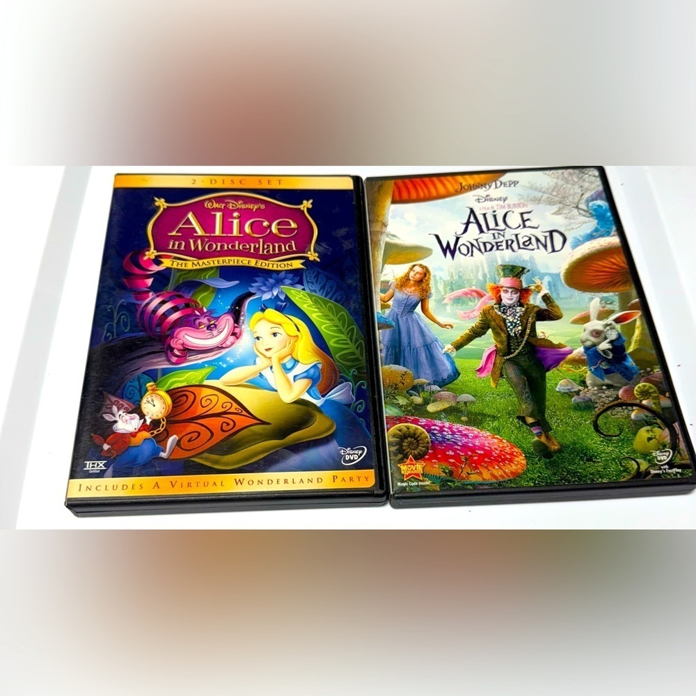 Disney’s Alice in Wonderland 2 Movie DVD Bundle.